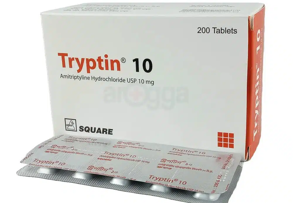 Tryptin 10 ট্যাবলেটের ক্লোজ-আপ ছবি, যা বিষণ্ণতা এবং স্নায়ু ব্যথার মতো মানসিক ও স্নায়বিক সমস্যার চিকিৎসায় ব্যবহৃত হয়। ট্যাবলেটগুলো একটি ফয়েল প্যাকেটে সারিবদ্ধভাবে সাজানো।