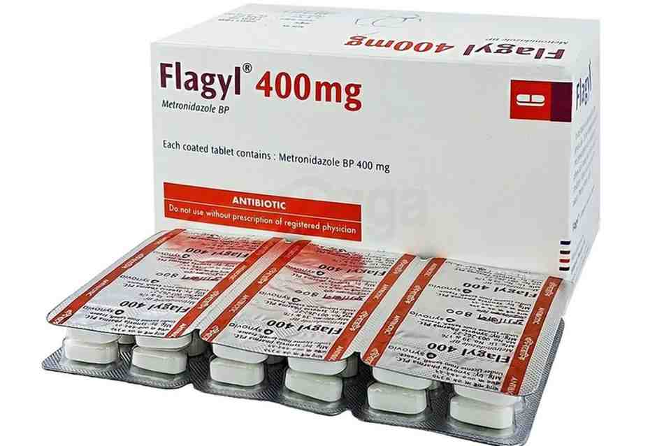 Flagyl 400 ট্যাবলেট, যা মেট্রোনিডাজল নামেও পরিচিত, বিভিন্ন ব্যাকটেরিয়াল এবং প্যারাসিটিক সংক্রমণের চিকিৎসার জন্য ব্যবহৃত একটি অ্যান্টিবায়োটিক ওষুধ। ছবিতে ট্যাবলেটগুলো একটি ফয়েল স্ট্রিপের মধ্যে দেখা যাচ্ছে।